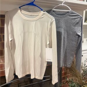 2 Lululemon long sleeve relaxed tops tags attached
